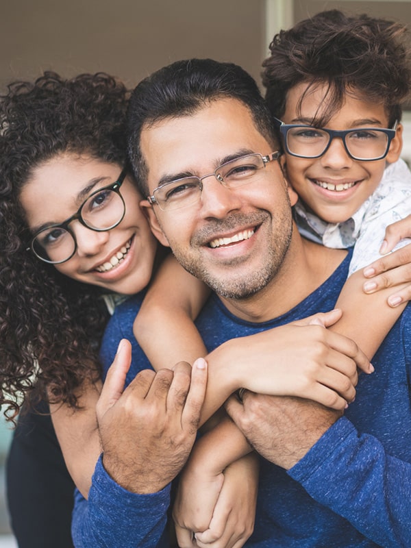 Father and daughter smiling together portrait | Troy City Orthodontics in Fall River, MA